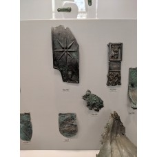 Bronze armor pieces from ancient statues